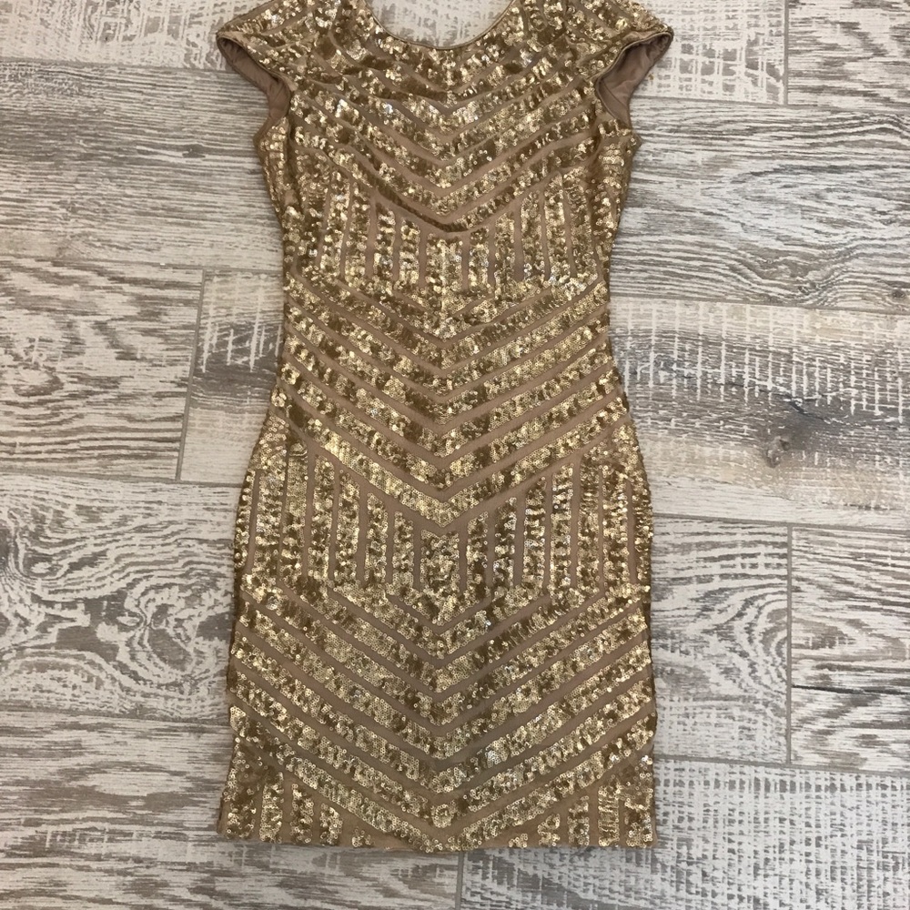 Gold sparkle form fitting dress